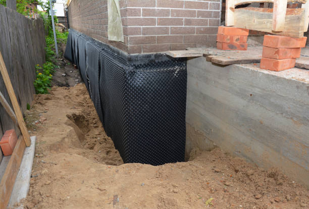 Happy homeowners after waterproofing job in Knox